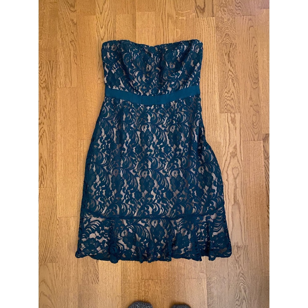 The limited strapless lace dress